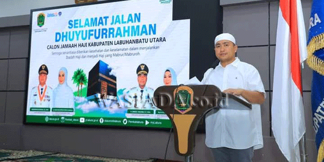 Hendriyanto-Sitorus-menyampaikan-kata-sambutan-sebelum-melepas-keberangkatan-jamaah-Calhaj-menuju-Embarkasi-Haji-Medan