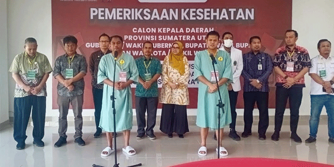 Darma-Wijaya-Adlin-Tambunan-saat-akan-melakukan-tes-kesehatan-di-RS-Haji-Medan.gif-2