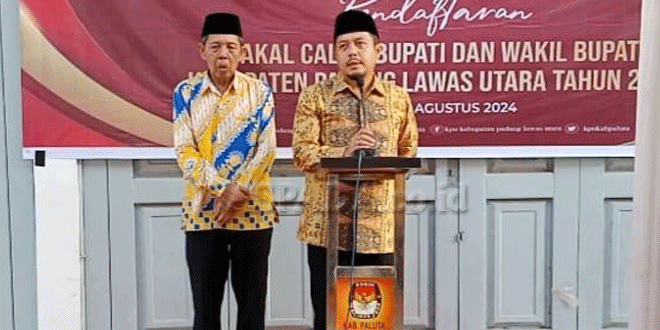 Ketua-KPU-Paluta-Raja-Dolok-Harahap-saat-konferensi-pers-pendaftaran-calon-Bupati-H-Riski-Basyah-Harahap-dan-H-Basri-Harahap.gif-2