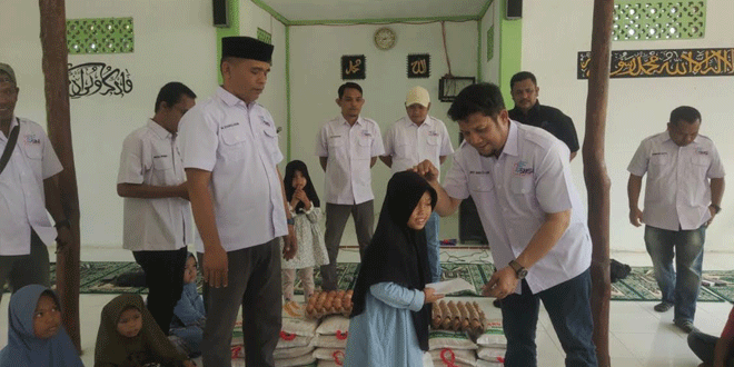 Peringati-2-Tahun-SMSI-Madina,-Pengurus-Salurkan-Sedekah-Mengharap-Berkah.gif-2